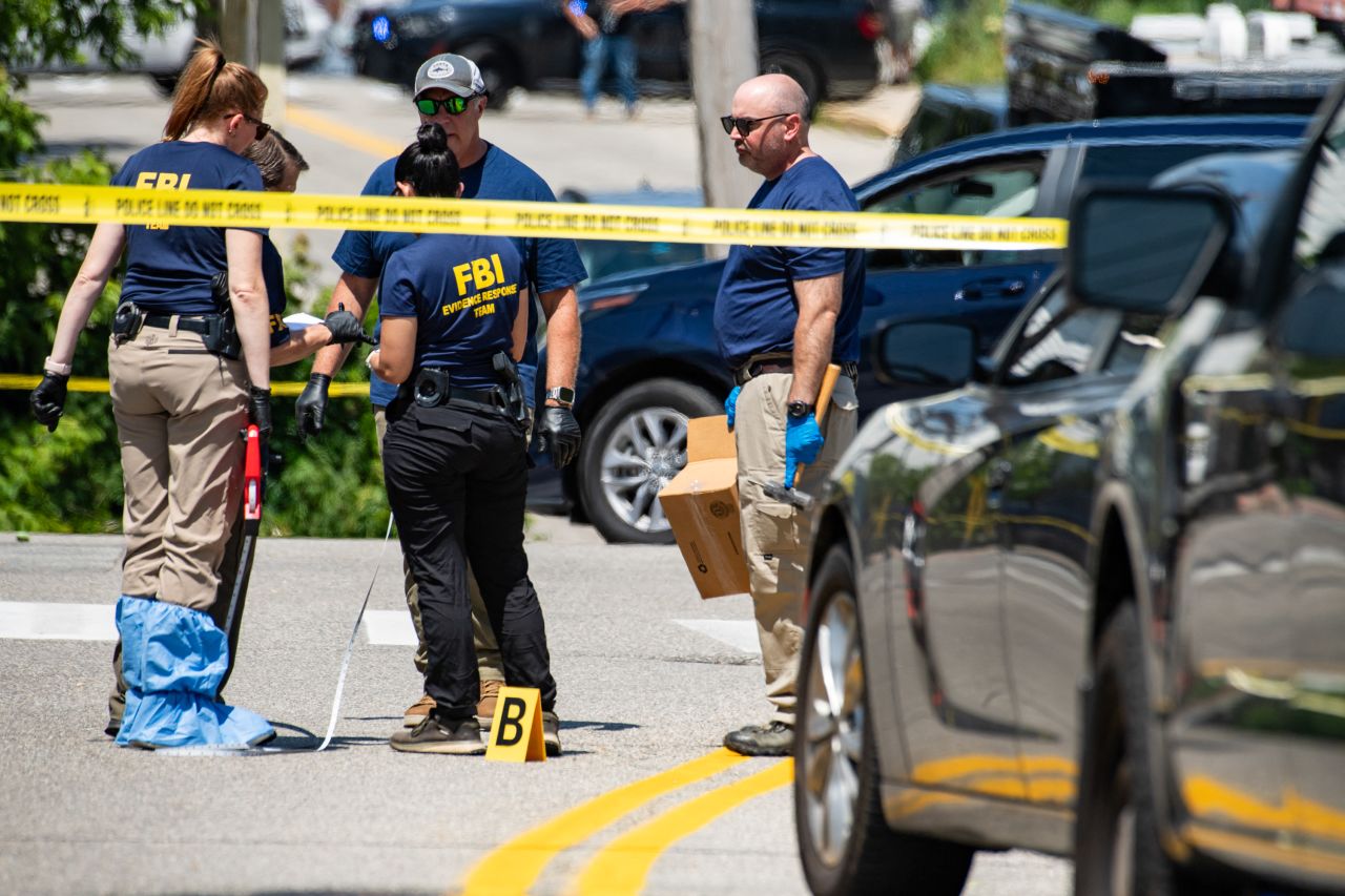 FBI investigators work the scene of an ICE-involved shooting in Biddeford, Maine, on Monday.