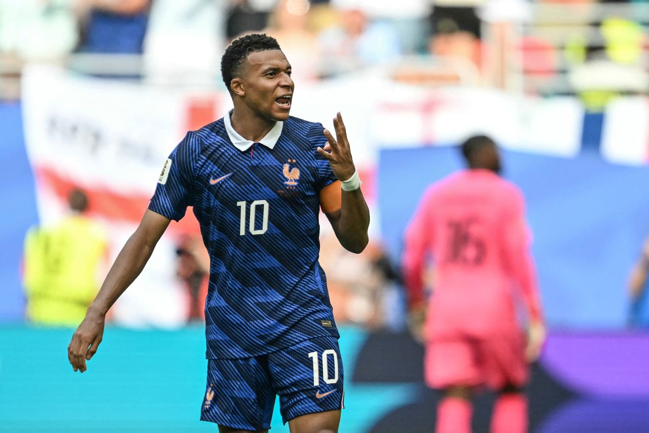 France's Kylian Mbappé celebrates his 10th goal of this tournament. It also put him atop the World Cup's all-time scoring list (22 goals).