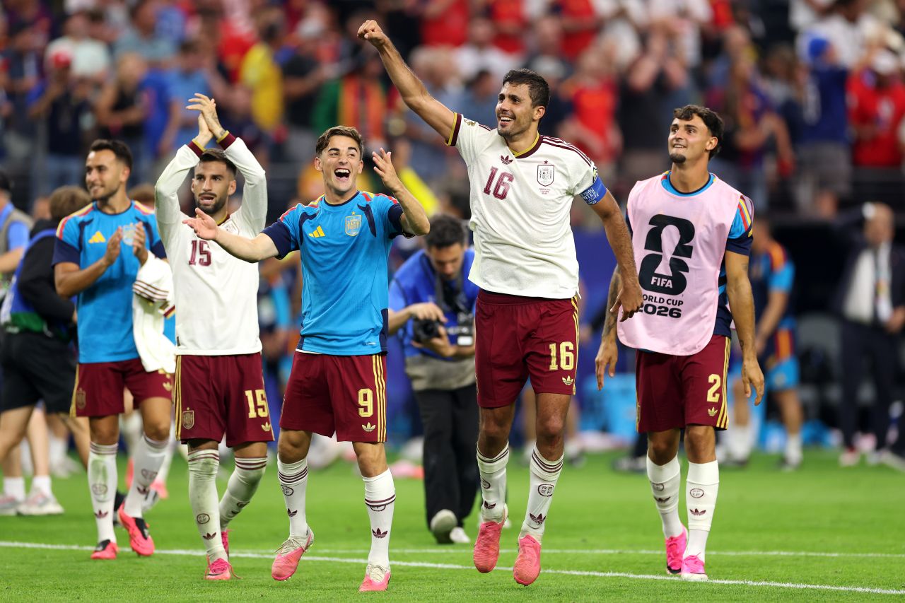 Spanish players celebrate after their semifinal win against France.