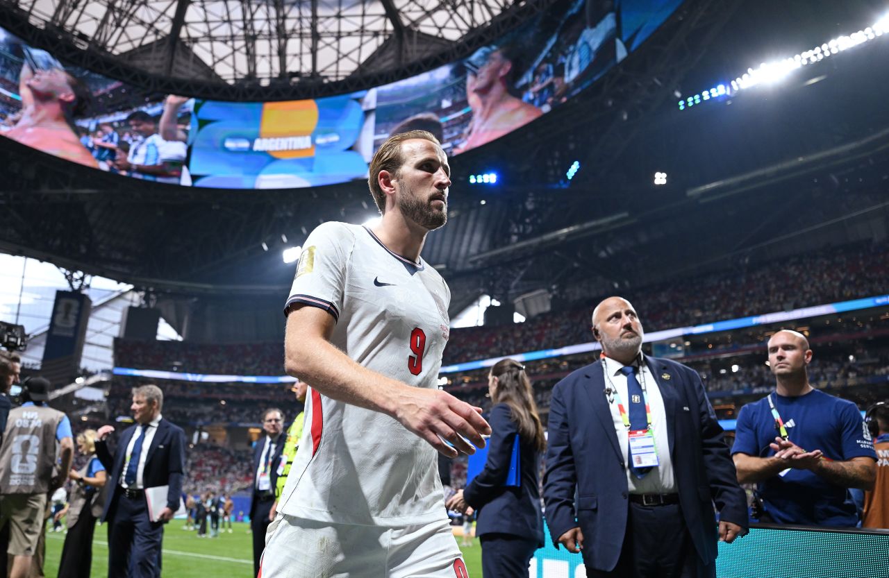 England captain Harry Kane walks off the pitch.