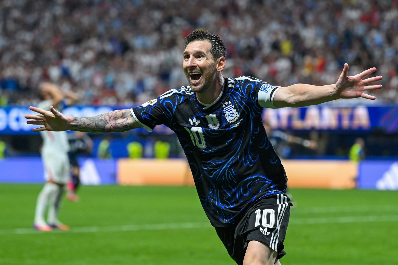 Argentina's Lionel Messi celebrates after his cross led to the winning goal against England in second-half stoppage time.