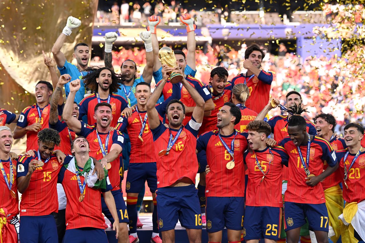 Rodri #16 of Spain lifts the FIFA World Cup trophy after the team’s victory following the match between Spain and Argentina at New York New Jersey Stadium on July 19.