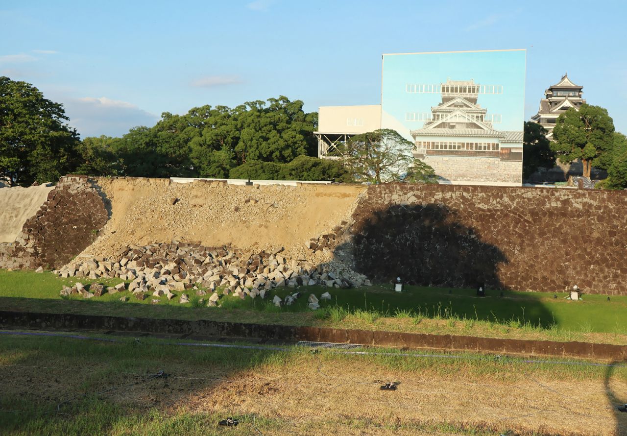 The collapsed stone walls of Kumamoto Castle are seen in Kumamoto City on Tuesday.