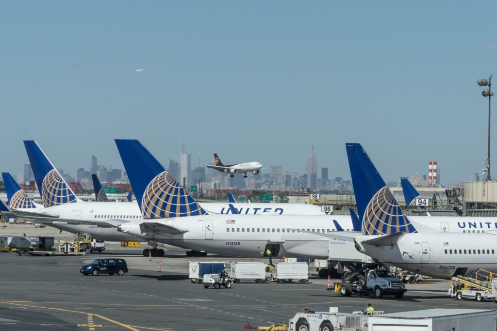 United passenger says crew ordered him to change controversial T