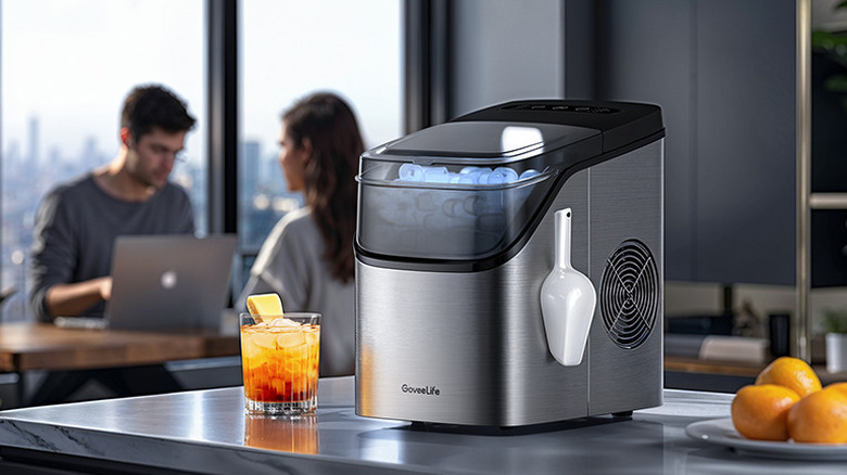 The GoveeLife H717D smart ice maker on a kitchen counter, making ice.