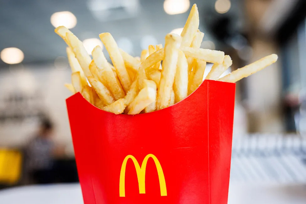 French fries in carton.