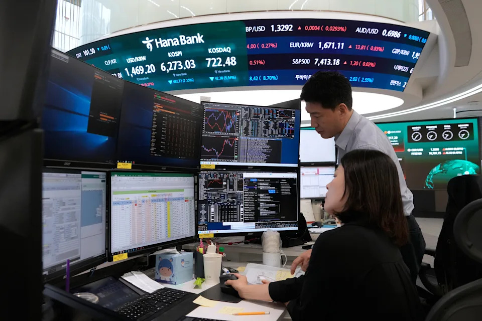 Asian shares slip and South Korea’s Kospi index sinks 10% on heavy selling of chipmaking stocks