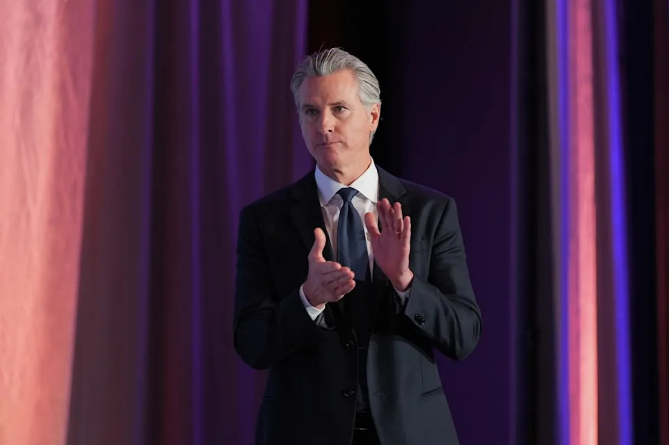 Gov. Gavin Newsom claps at the National Association of Latino Elected and Appointed Officials conference. AP Photo/Jae C. Hong