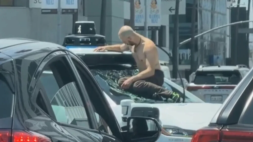 Shirtless Man Climbs on Waymo, Rips Off Parts During East Hollywood Traffic Jam Shirtless Man Climbs on Waymo, Rips Off Parts During East Hollywood Traffic Jam