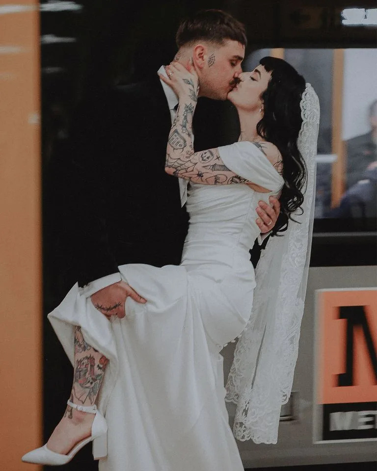 Dan Wilkin (left) and Amy Wilkin (right) on their wedding day.Credit: Kennedy News/brianmccartneyweddings