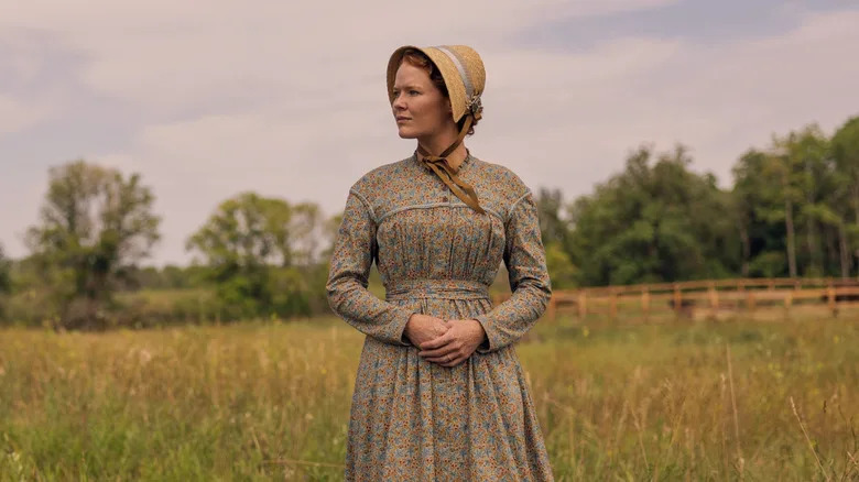 Crosby Fitzgerald as Caroline Ingalls standing in a field in Little House on the Prairie
