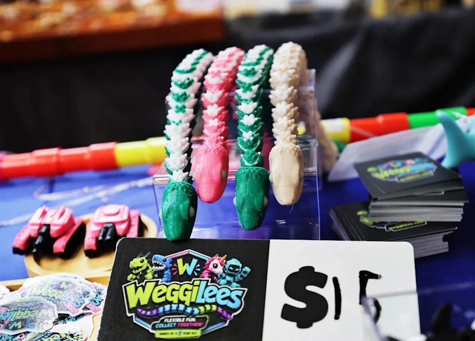 These 3D-printed wiggly snakes, which have glow-in-the-dark eyes, are among several figurines made by Rui Qi.