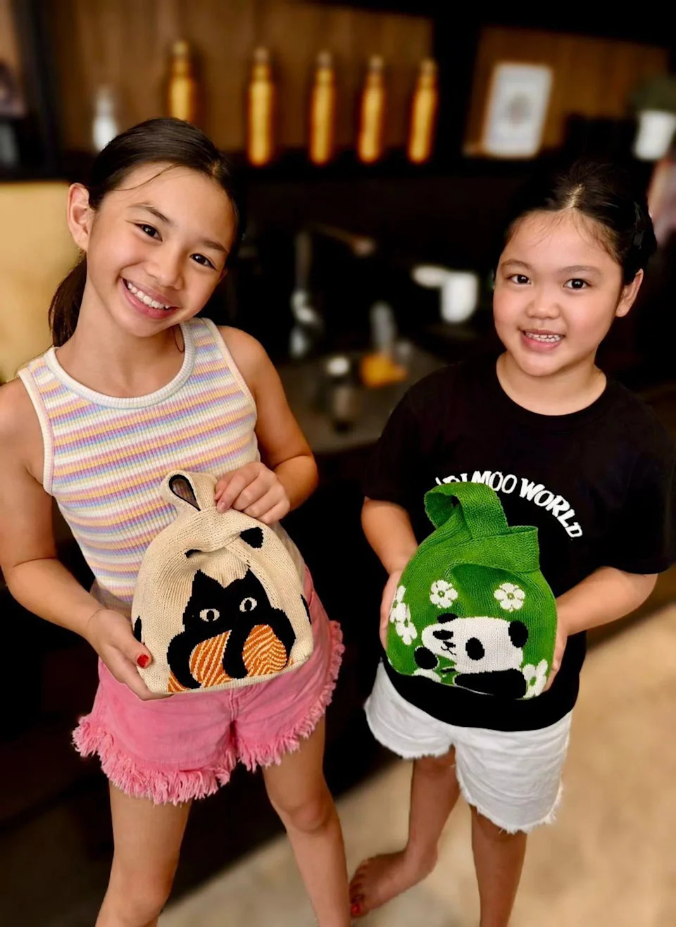 Cousins Kimberlyn Chia (left) and Jadynn Lim with their "blind bags".