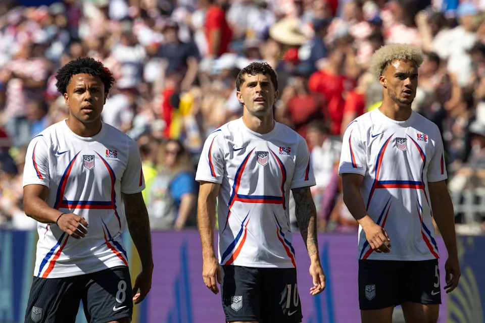 SEATTLE, WASHINGTON - JULY 6: McKennie Weston #8 of the United States, Christian Pulisic #10 of the United States, and Antonee Robinson #5 of the United States walk off the pitch before the FIFA World Cup 2026 Round Of 16 match between USA and Belgium at Seattle Stadium on July 6, 2026 in Seattle, Washington. (Photo by Al Sermeno/ISI Photos/ISI Photos via Getty Images)