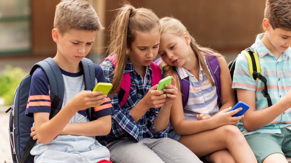 Children on smartphones