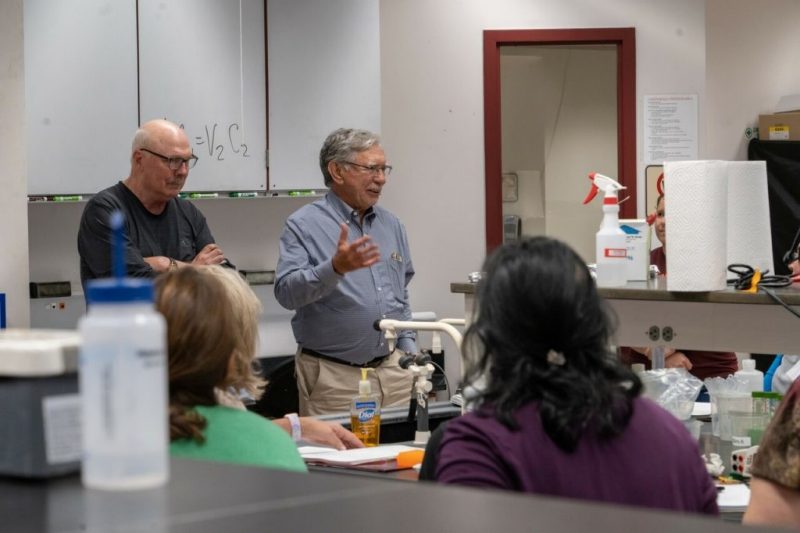 Dennis Dean (left) and Tracy Wilkins talk with high school science teachers at a Biotech in a Box workshop in 2023. Photo by Clark DeHart for Virginia Tech.