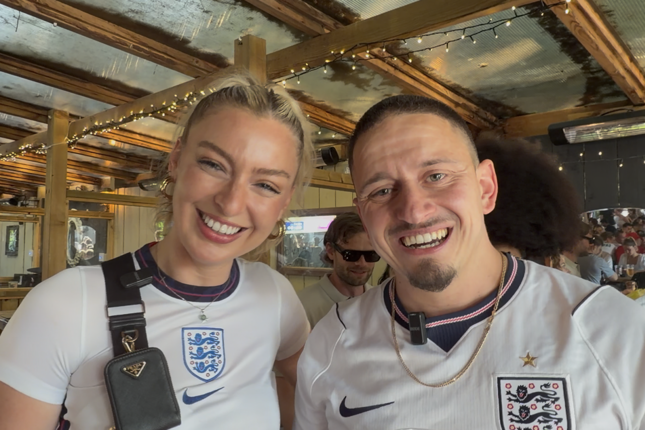 Joey Freeman, right, is taking in the match from the Black Lion pub in west London.