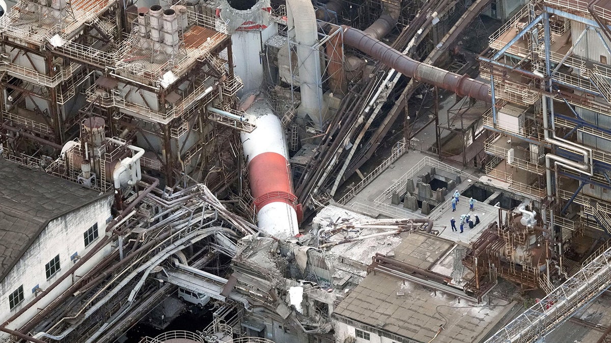 An aerial view shows a collapsed chimney at Nippon Paper Industries' Yatsushiro Mill after an earthquake with a preliminary magnitude of 7.1 struck Japan's southern Kumamoto prefecture, in Yatsushiro, Kumamoto Prefecture, Japan, July 28, 2026. Kyodo/via REUTERS ATTENTION EDITORS - THIS IMAGE HAS BEEN SUPPLIED BY A THIRD PARTY. MANDATORY CREDIT. JAPAN OUT. NO COMMERCIAL OR EDITORIAL SALES IN JAPAN. TPX IMAGES OF THE DAY