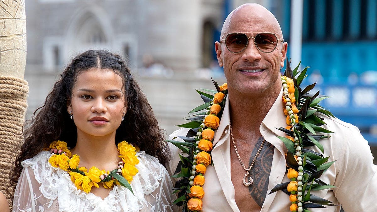 Catherine Laga'aia and Dwayne Johnson attend Moana Experience launch.