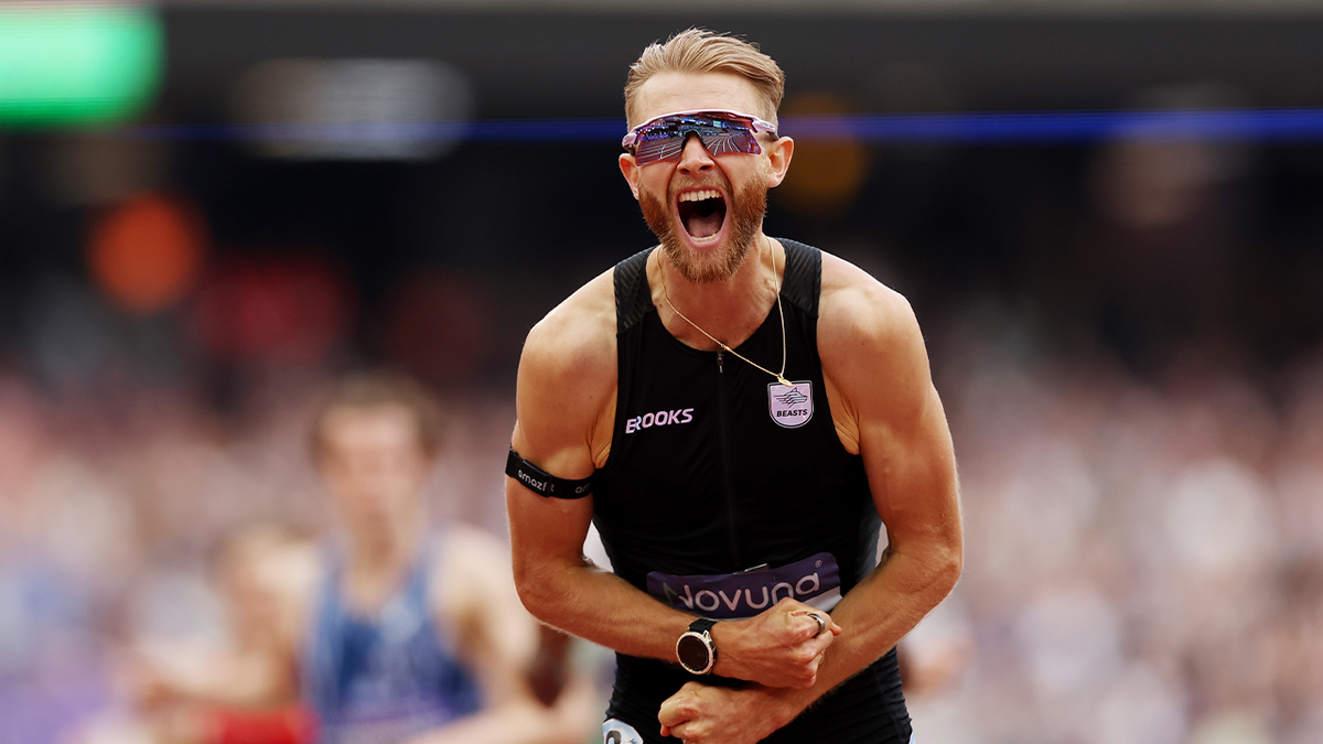 Josh Kerr celebrates after breaking men's mile world record at London Diamond League.