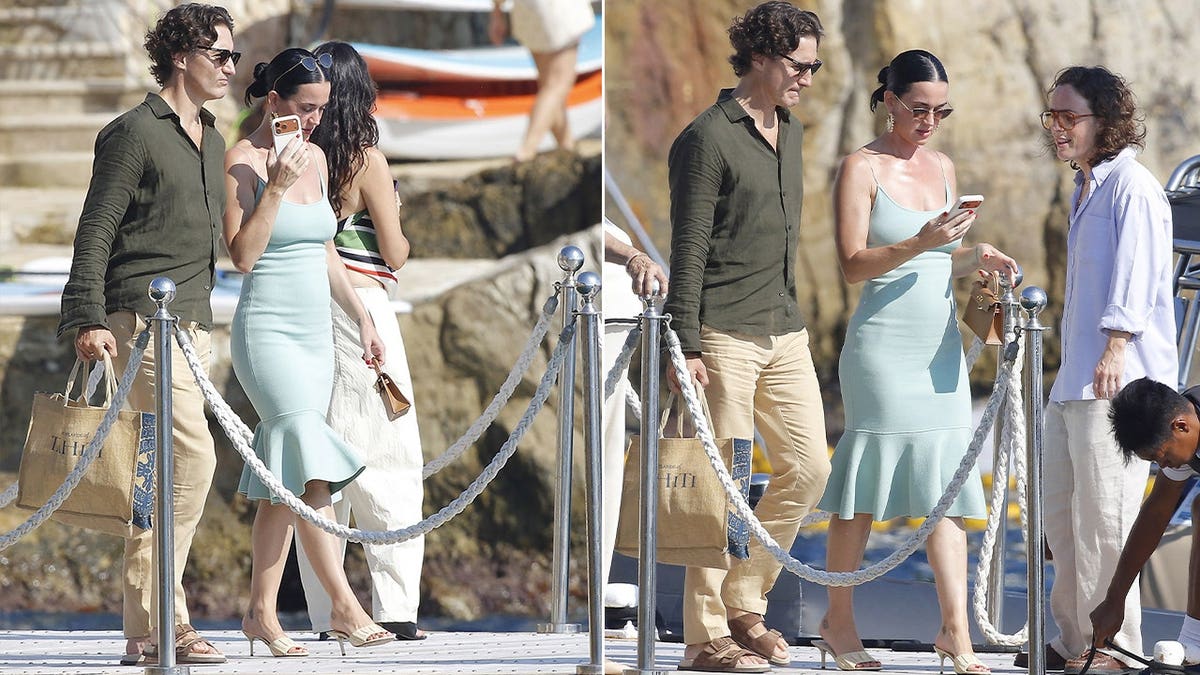 Katy Perry, Justin Trudeau on a boat dock