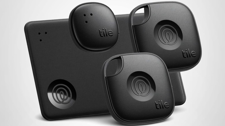 The Life360 Tile Essential Bluetooth trackers, with two Tile Mates, a Tile Slim, and a Tile Sticker.