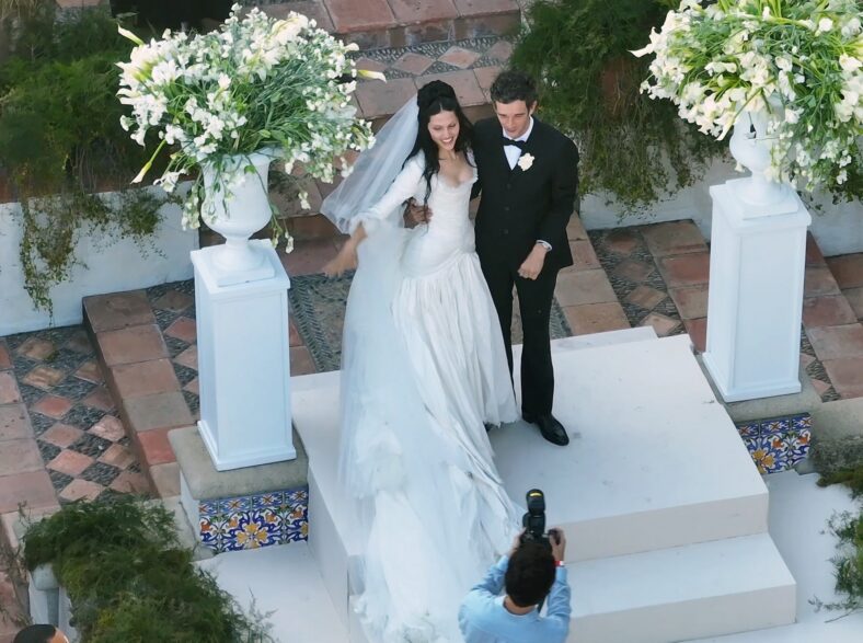 Matty Healy and Gabriette pose for photos after getting married in Los Angeles