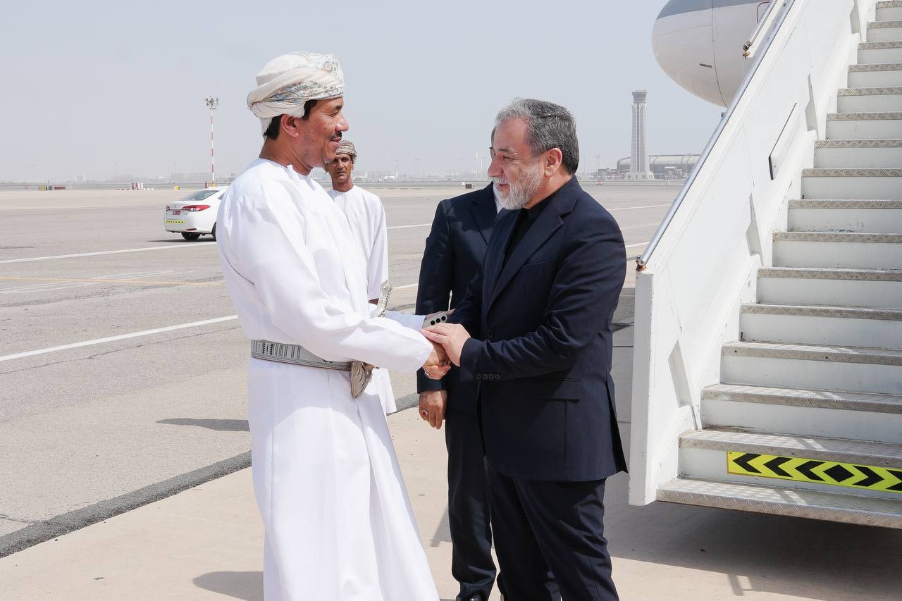 Photos show Iran's foreign minister welcomed by Omani officials in Muscat on Saturday.