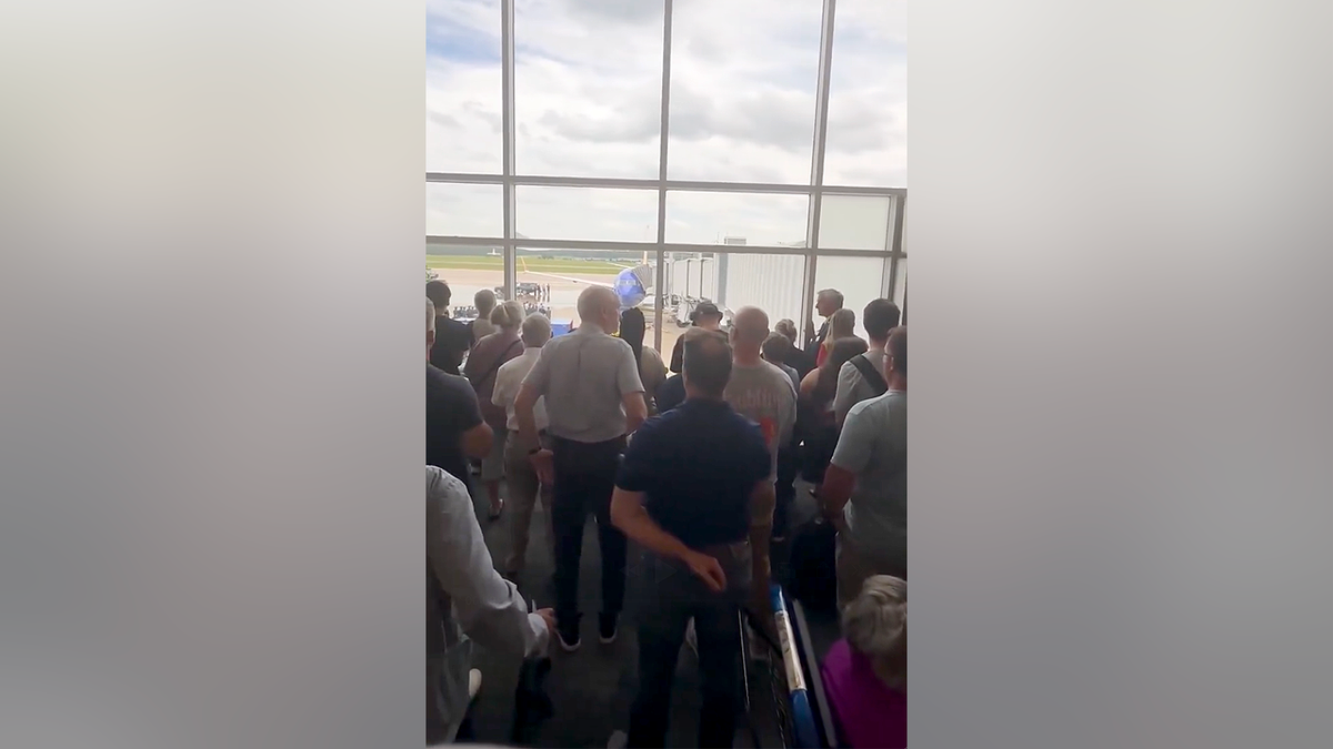 Travelers stand in silent tribute as fallen US service member returns home at RDU Airport