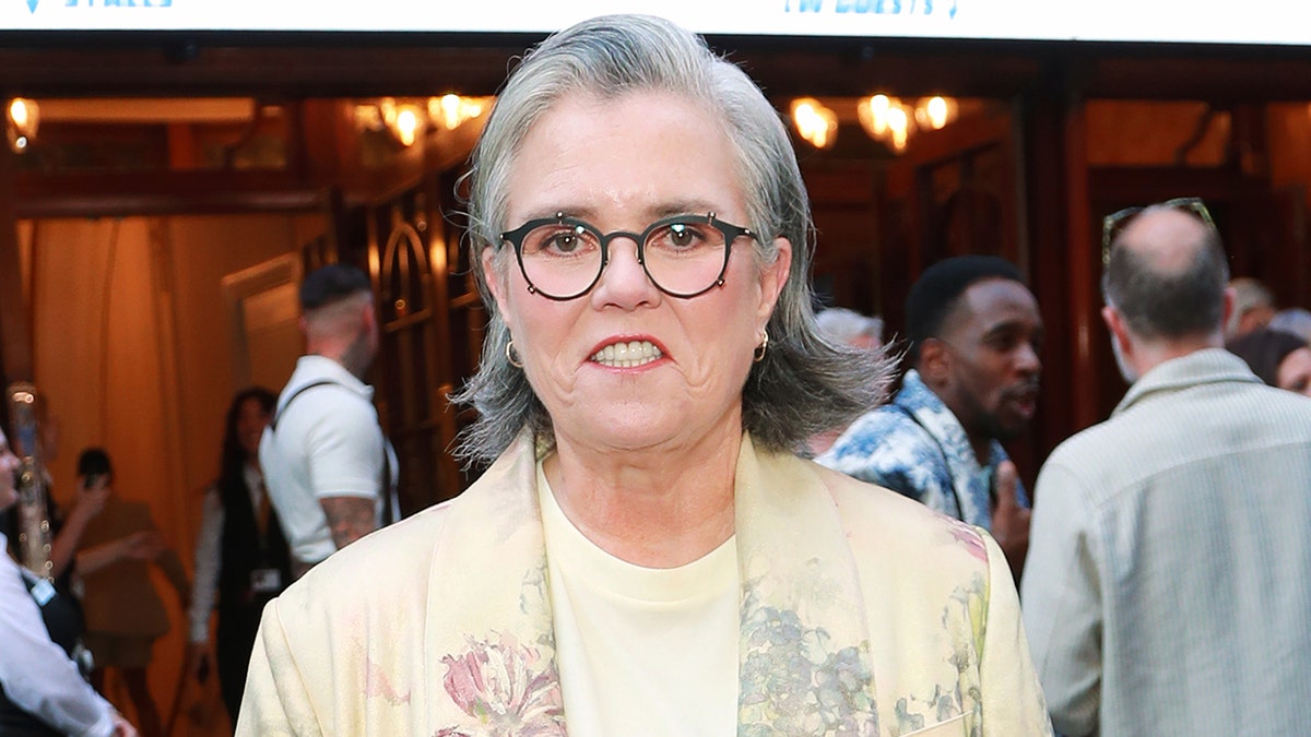 Rosie O'Donnell smiles for the camera at the London performance of
