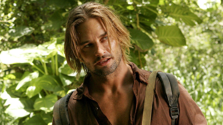 James "Sawyer" Ford smirking with the jungle trees behind him