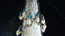 Climbers compete at the 2026 Cheung Chau bun scrambling competition in Hong Kong