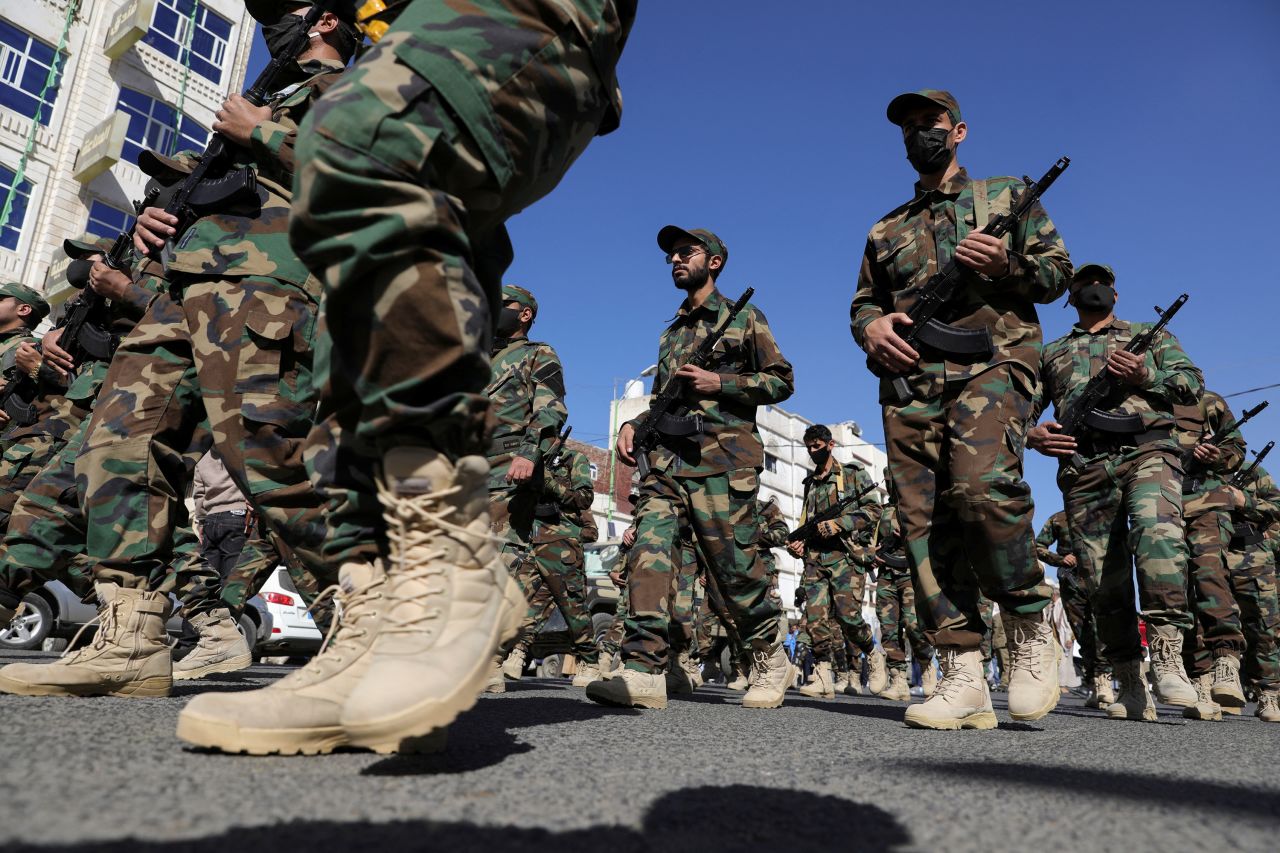 Houthi fighters take part in a parade for people who attended Houthi military training as part of a mobilization campaign, in Sanaa, Yemen, on December 18, 2024.