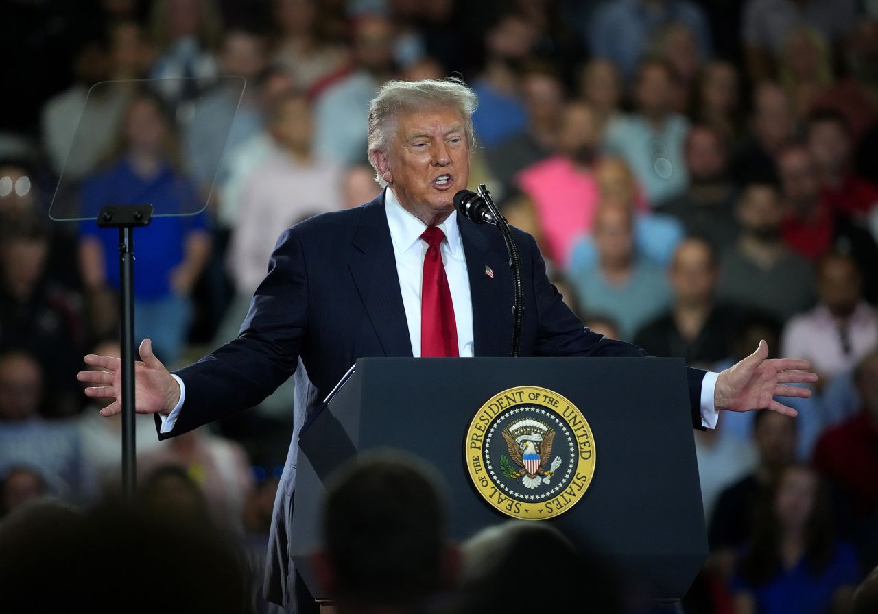 President Donald Trump speaks at General Motors’ Milford Proving Grounds in Milford, Michigan, on July 27, 2026, during a rally in which he repeatedly labeled Democrats as communists.