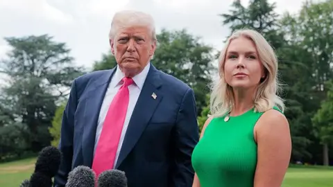 Getty President Donald Trump, joined by White House Press Secretary Karoline Leavitt, speaks to the media as he departs the White House on July 15, 2025 in Washington, DC