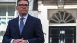 Britain's newly appointed Prime Minister Andy Burnham looks on as he delivers a speech outside 10 Downing Street after taking office, in London, Britain, July 20, 2026.