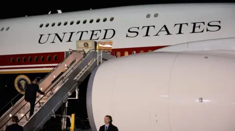 Reuters Trump then boards the Qatar-gifted jet in the UK