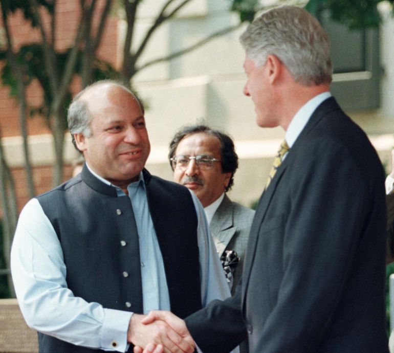 U.S. President Bill Clinton shakes hands with Pakistani Prime Minister Nawaz Sharif outside Blair House following their talks on Kashmir in Washington July 4. Clinton and Sharif said they had agreed that concrete steps will be taken to restore the line of control in Kashmir.TB/RC/kc
