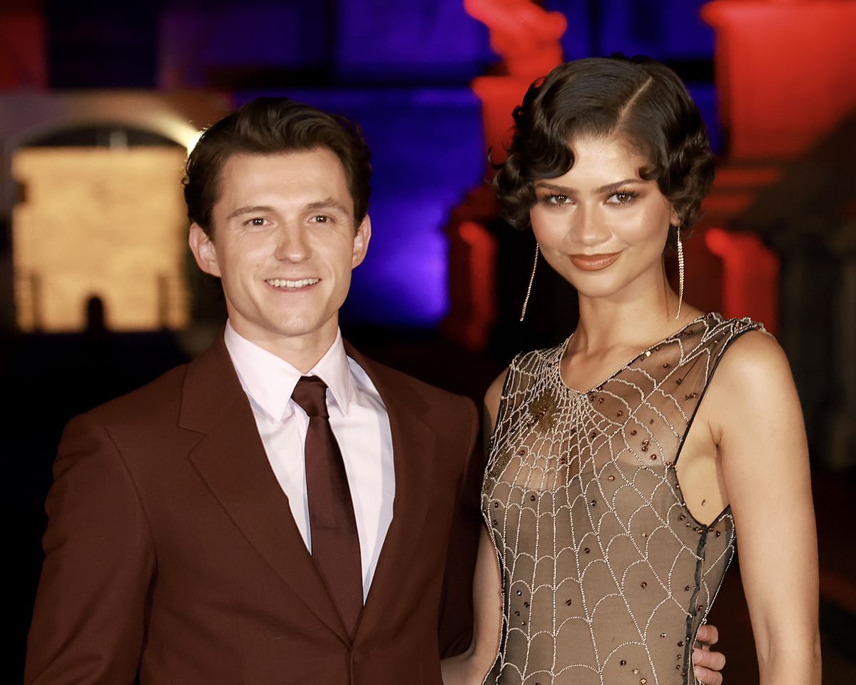 Tom Holland and Zendaya in June 2026. Her ‘t’ tattoo is below her underarm.Credit: Franco Origlia/WireImage