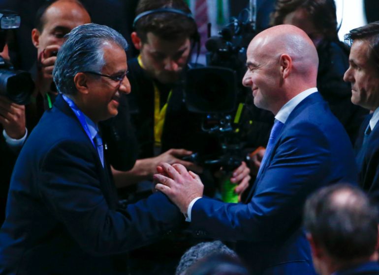 FIFA presidential candidate Sheikh Salman Bin Ebrahim Al-Khalifa of Bahrain (L) congratulates newly elected FIFA President Gianni Infantino during the Extraordinary Congress in 2016