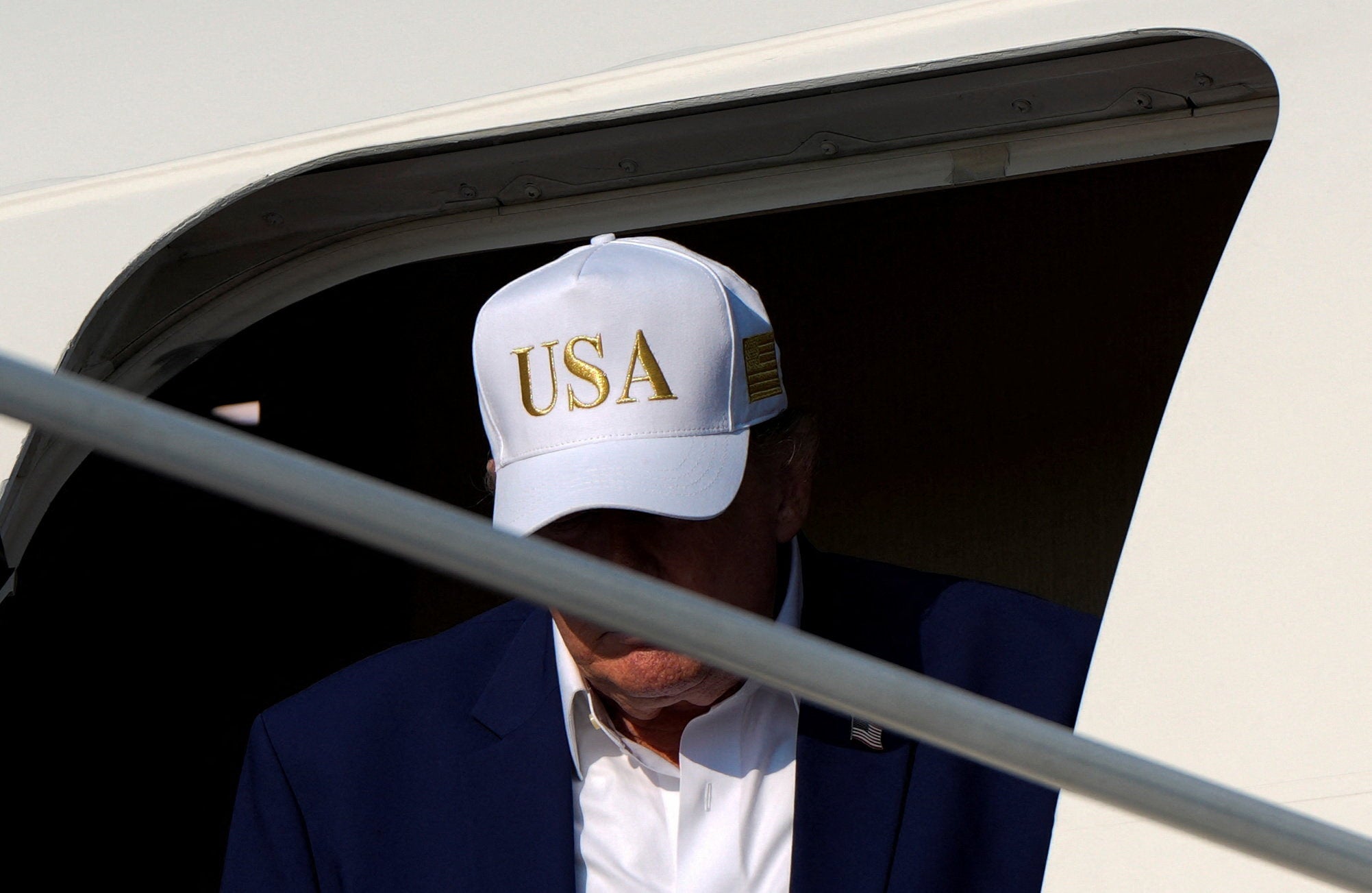US president Donald Trump disembarks Air Force One at Joint Base Andrews, Maryland, US, 9 August 2026