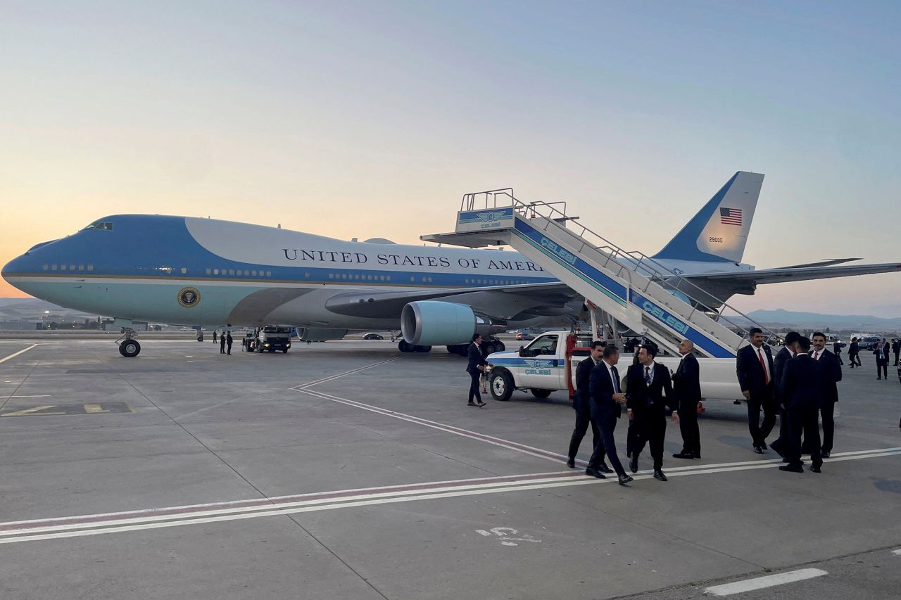 A catering truck is parked on the other side of Air Force One, before US President Donald Trump's departure from Ankara en route to Washington after his participation in the NATO leaders' summit, at Ankara Esenboga Airport in Ankara, Turkey, on July 8.