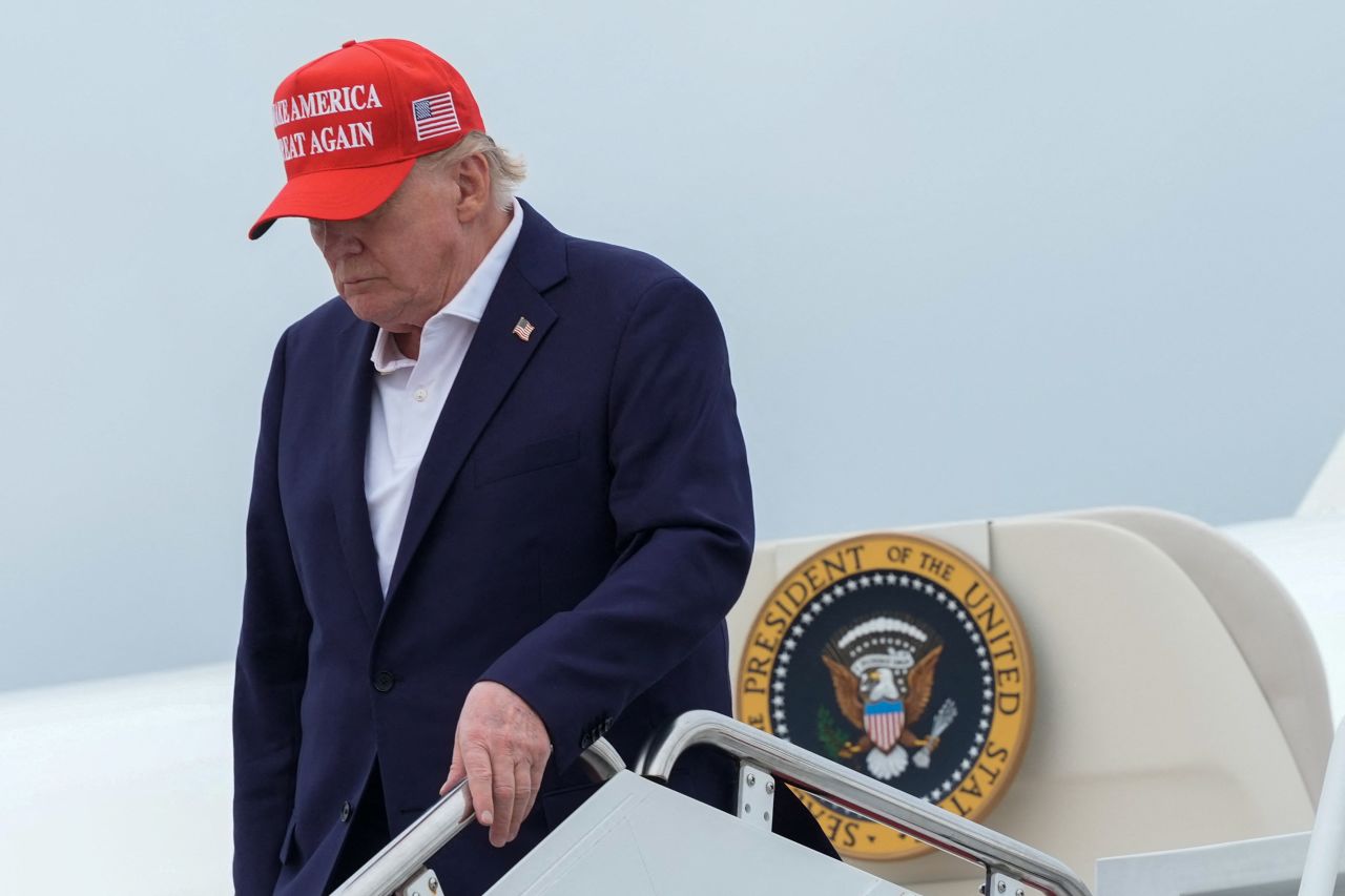 Donald Trump disembarks Air Force One at Joint Base Andrews, Maryland, U.S., on August 16.