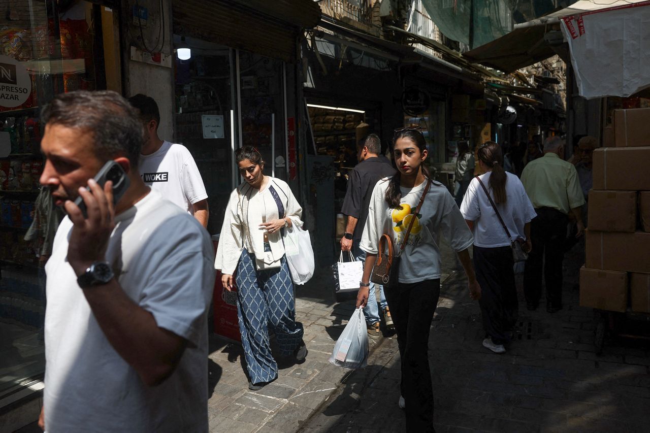 People walk in the Grand Bazaar in Tehran, Iran, on August 17.