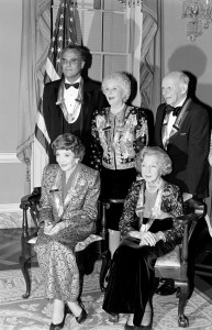 (clockwise from top L) Harry Belafonte, Mary Martin, William Schuman, Alexandra Danilova, and Claudette Colbert attend an event at the headquarters of the U.S. State Department in Washington, D.C., on December 2, 1989. (Photo by Guy DeLort/WWD/Penske Media via Getty Images)