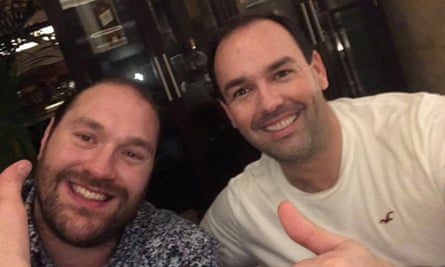 Kinahan (right) giving a thumbs up sign with the boxer Tyson Fury in 2020. Both are looking at the camera and smiling.