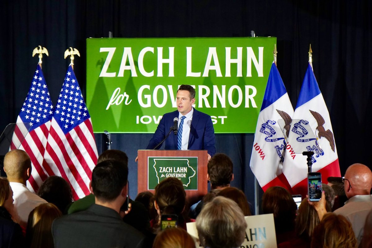 Zach Lahn stands before a crowd, backed by a sign for his gubernatorial race. Photo credit: Zach Lahn campaign