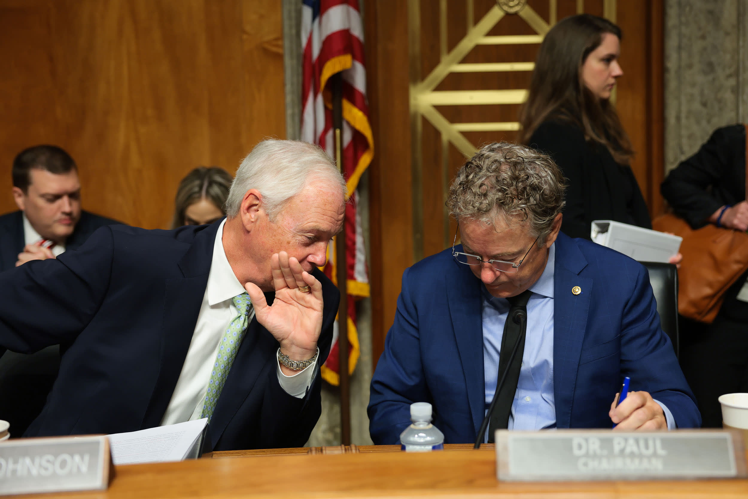 Sen. Ron Johnson speaks to Sen. Rand Paul