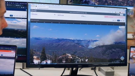 A monitor show a wildfire.