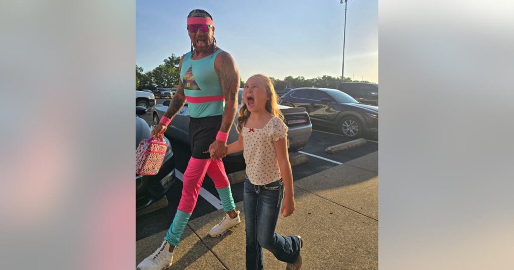 North Texas dad dresses like 80s fitness instructor to drop his kids off on their first day